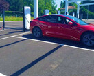 Tesla at the new V4 Supercharger station (image: Alexandre Druliolle)