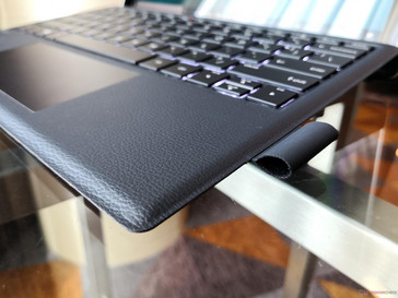 Envy x2 ARM. Leather-like "Pebble" base texture is easier to clean compared to the Surface Pro Alcantara
