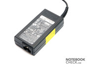 The small power adapter supplies 65 watts.