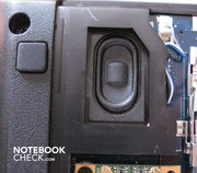 Left speaker (uncovered).