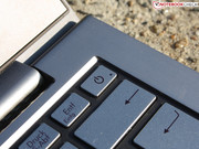 The power on button is part of the keyboard.