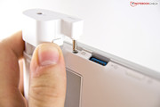 By pressing the release, a slider can be pulled out and the battery can be docked.