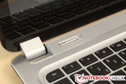The power button is also integrated into the silver-scheme.