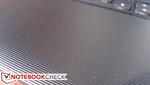 Grooved plastic covers both the palm rest and display lid