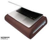 The upper surface has sufficient room for devices up to 15-inches.