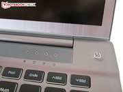 The status LEDs are located beside the power button.