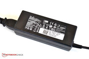 The power adapter provides 90 Watts which is more than enough.