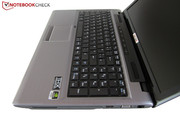 The optical drive dominates the right.
