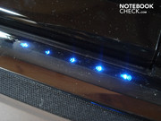 Conclusively, there is also a volume control on the bar with touch-sensitive hotkeys.