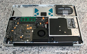 8 screws later, you can also easily remove the cover below ...