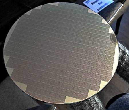 Micron has shown a flash wafer with their new 64 GB QLC memory chips.