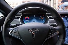 The newest software update for Tesla vehicles makes self-driving a partial reality. (Source: The Verge)