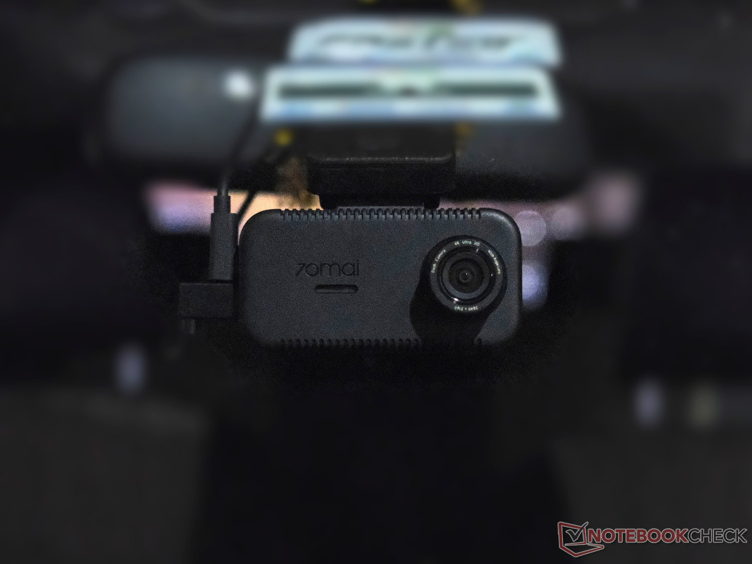The 70Mai A810 Lite dashcam mounted on the windshield of a car.
