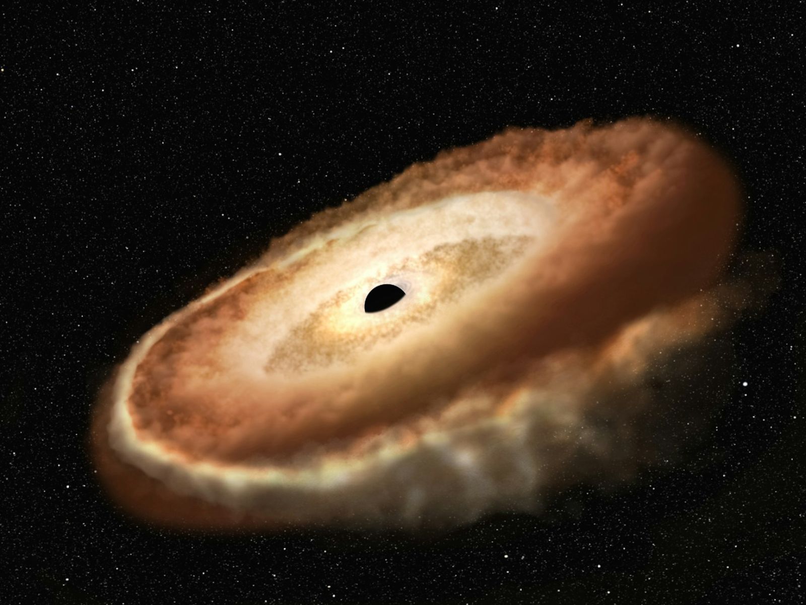 With a mass of about 50 billion times that of the Sun, this black hole is one of the largest ever discovered