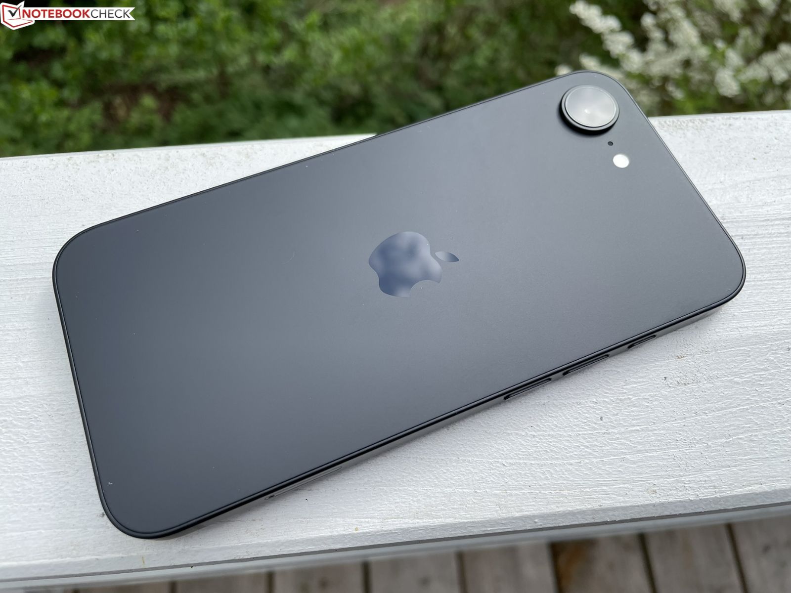 Rear view of the black iPhone 17e showing the single-camera module and matte back panel (Image source: Notebookcheck)
