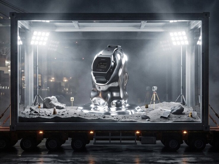 Casio x GRAGG LW-204GRAGG-1BDF displayed on its silver stand inside a glass installation with a lunar-themed backdrop.