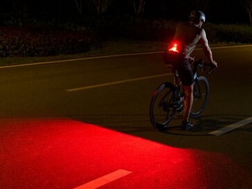 The red LED in the Olight Oclip 2 can be set to flashing mode while bicycling.