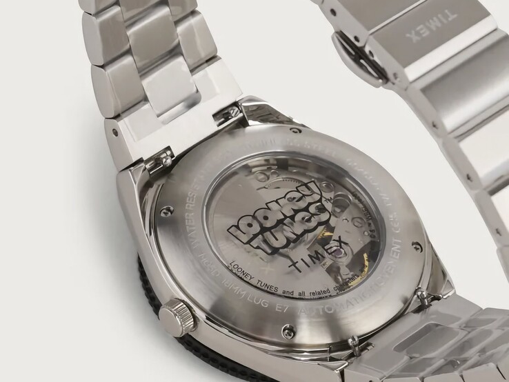 Rear view of the Timex Looney Tunes x M79 Automatic showing its exhibition caseback, with the automatic movement visible through the transparent window and Looney Tunes branding around it.