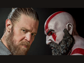 Ryan Hurst and Kratos statue face-to-face from God of War game. (Source: Prime Video via X)
