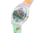Colourful Swatch watch featuring a futuristic Tokyo cityscape, yellow lightning-shaped hands and a turquoise and blue design.