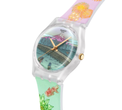 Colourful Swatch watch featuring a futuristic Tokyo cityscape, yellow lightning-shaped hands and a turquoise and blue design.