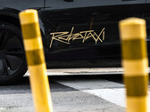 The Tesla Robotaxi ride-share platform logo on the new Model Y. (Image source: @artsimage/X)