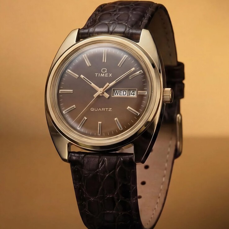 Timex Q 1976 Day and Date reissue with a smoky brown gradient dial, gold-tone indices, and a dark brown crocodile-grain leather strap.