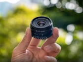 The cookie lens is overall smaller than a typical pancake lens, but not quite as flat (Image source: Laowa)