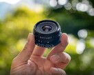 The cookie lens is overall smaller than a typical pancake lens, but not quite as flat (Image source: Laowa)