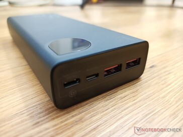 Four USB ports. Two can be used to charge the bank while three are outputs