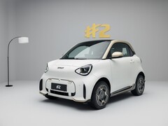 The Smart #2 Couture Edition features matte white paint, a gold-colored roof and 16-inch alloy wheels with gold accents. Other highlights include a fixed glass roof, heated seats and a seven-speaker Sennheiser sound system.