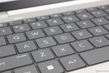 Two-level white backlight illuminates all keys and symbols