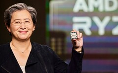 AMD CEO Lisa Su showcases a Ryzen processor. Her 2025 pay package has been raised to $33 million. (Image source: AMD)