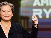 AMD CEO Lisa Su showcases a Ryzen processor. Her 2025 pay package has been raised to $33 million. (Image source: AMD)