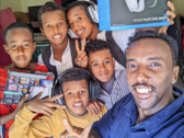 Mohammed (right) in his internet café, "Power Net". (Image source: Reddit)
