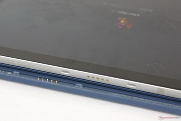 Keyboard base attaches magnetically to the bottom edge of the tablet