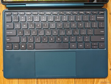 QWERTY layout. The Bluetooth connection key is near the top right corner