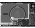 An x-ray of an iPhone 12 showing internal packaging including the battery. (Image: Creative Electron)