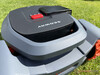 Solid handle for carrying the almost 20 kg robotic lawn mower