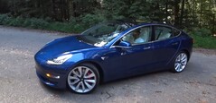 The 2018 Tesla Model 3 Performance is an excellent sedan with a 75 kWh battery pack. (Image source: Redline Reviews via YouTube)