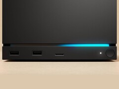 Front view of the Valve Steam Machine with dual USB ports, a USB-C port, a power LED, a round power button and a blue LED strip. (Image source: Valve)
