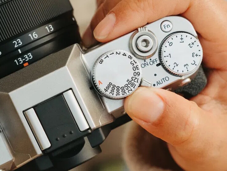 Direct control dials sit next to the central popup flash on the top of the Fujifilm X-T30 III camera. (Image source: Fujifilm)