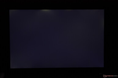 Moderate uneven backlight bleeding along the top edge