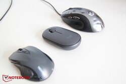 From bottom to top: Noname Bluetooth mouse, Logitech MK470, worn-out classic MX518
