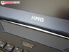 An XMG logo is located above the power button.
