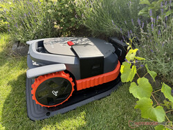 Navimow X3 in its charging station