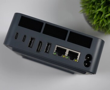 Rear I/O of the Beelink EQi 304 mini PC showing dual Thunderbolt 4 ports, HDMI, USB Type-A ports, dual Ethernet ports and power input.