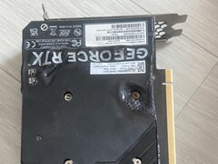 Melted backplate of an EmTek StormX Dual RTX 4060 Ti GPU. (Image source: user_634494 on Quasar Zone)