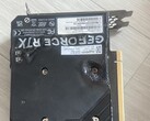 Melted backplate of an EmTek StormX Dual RTX 4060 Ti GPU. (Image source: user_634494 on Quasar Zone)