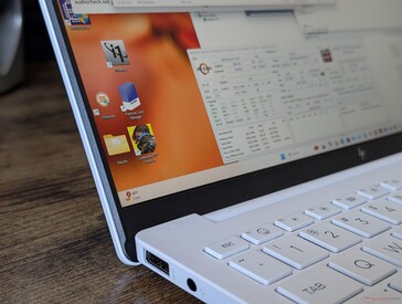 No edge-to-edge glass or touchscreen to keep weight low